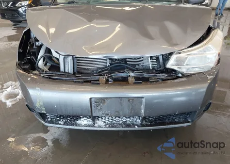 2009 Ford Focus S z USA, uszkodzony, nr VIN 1FAHP34N69W212424